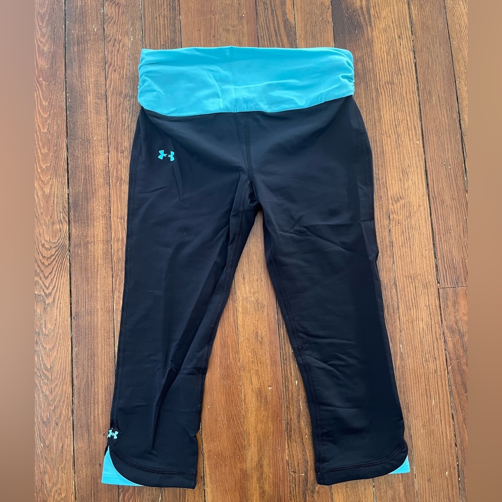 Under Armour size small blue and black capri length work out pants
